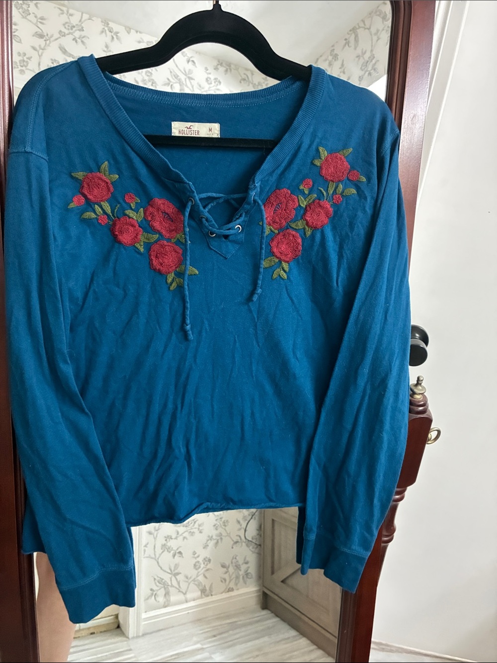 Hollister Teal Lace-Up Long Sleeve Top with Red Rose Embroidery